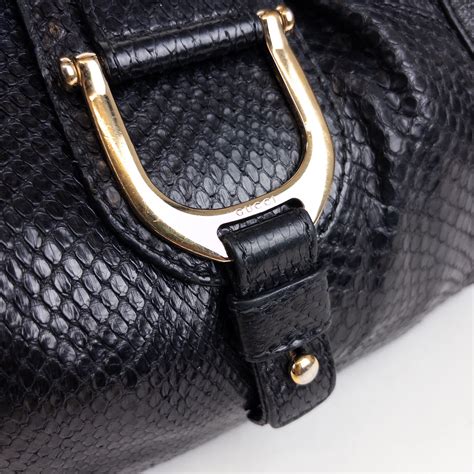 gucci python stirrup bag